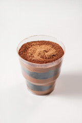 sweet dessert with cacao in a disposable bowl. food delivery