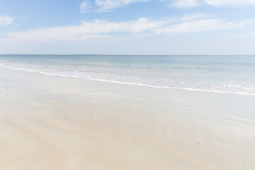 Fototapeta na wymiar Ocean, beach, blue sky white clouds