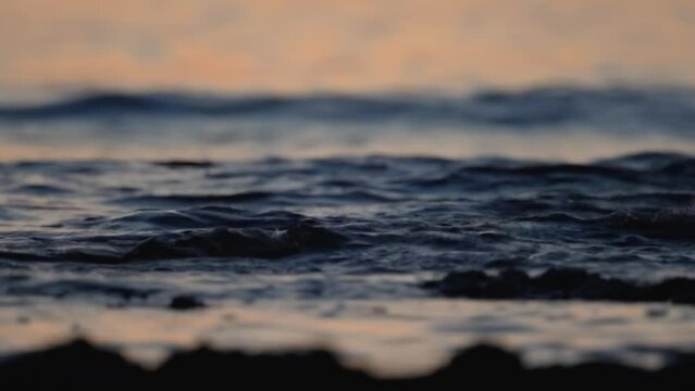 The sea tide in the predawn twilight