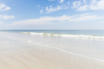 Ocean, beach, blue sky white clouds