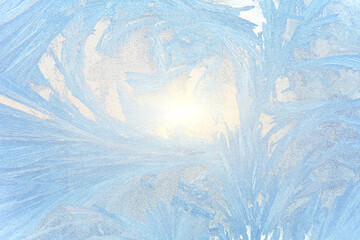 Ice patterns on glass, snow on the window, winter background