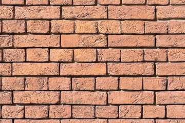 Obraz premium Old red brick wall, natural rough gritty texture. For natural background