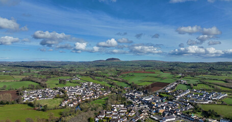 Aerial photo of Broughshane village Residential areas St Patricks Slemish Mountain in background Antrim N Ireland