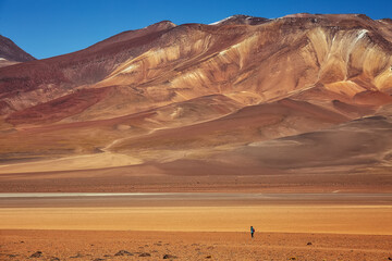 A tourist travels through the beautiful valley of Salvador Dali. Bolivia.
