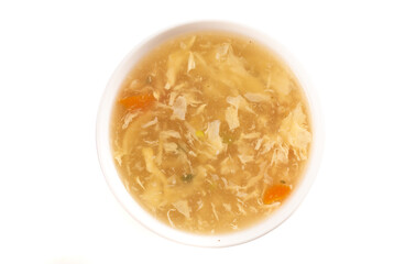 Egg drop soup isolated on a white background