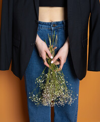 girl with flowers in her hands