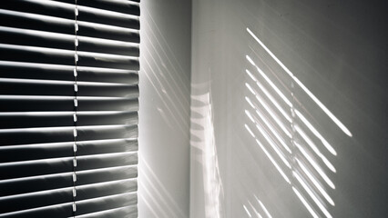 Obraz premium Architectural shadows. Sunlight architecture abstract background with light, black shadow overlay from window on white texture wall. Mockups, posters, stationary, wall art, design presentation.