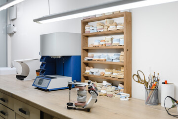 workplace of a dental technician with plaster models in an articulator