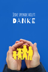 Text Jede spende hilft danke in German language means every donation helps thank you. Blue yellow...
