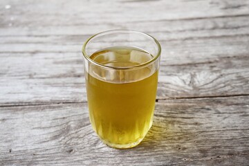 Chrysanthemum tea on brown wood background