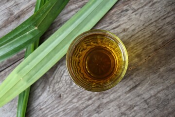 Chrysanthemum tea on brown wood background