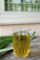 Chrysanthemum tea on brown wood background