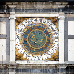 Close up on the tower with Astronomical clock in Piazza della Loggia. Brescia, Italy.