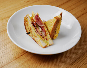 fried sandwich with meat and vegetables