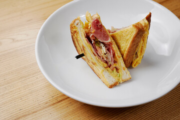 fried sandwich with meat and vegetables