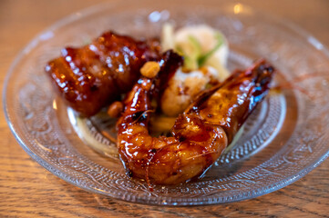 King prawns with smoked bacon with BBQ Sauce starter dish