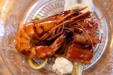 King prawns with smoked bacon with BBQ Sauce starter dish