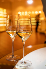 Tasting of brut champagne sparkling wine produced by traditional method in underground caves