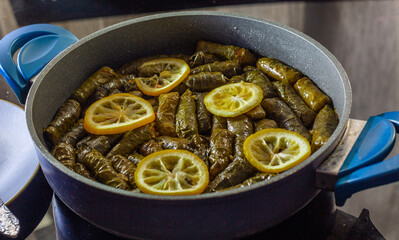 bulgur meal wrapped in grape leaves