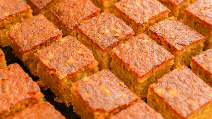 Carrot cake in small portions, on the table