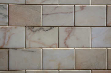 close-up background of marble tiles in wall