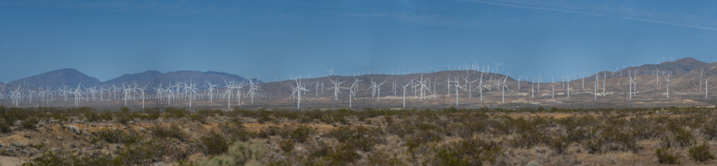 Obraz premium Wind turbine farm on a hillside in the Mojave Ca. mountains 