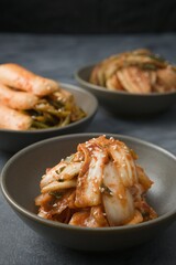 Delicious Kimchi stacked in bowls.