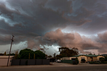 heavy storm clouds over house