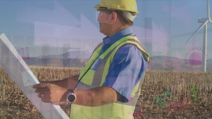 Animation of graphs and arrows over caucasian male worker with plans and field with wind turbine - Powered by Adobe