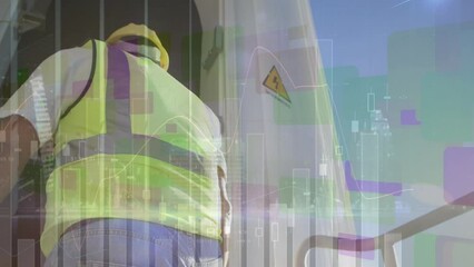 Animation of graphs and data over caucasian male worker walking into wind turbine - Powered by Adobe