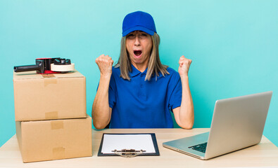 senior gray hair woman shouting aggressively with an angry expression. employee packer concept