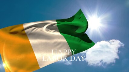 Animation of happy labor day text over flag of ivory coast and blue sky - Powered by Adobe