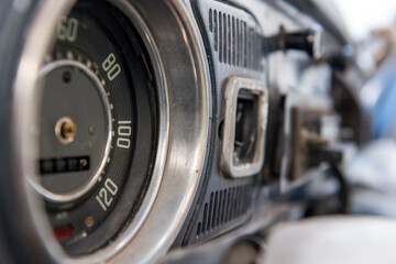 Fototapeta na wymiar Details of a speedometer of an old vintage car being repaired.