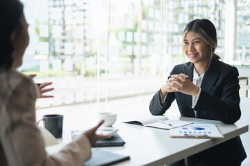 During a job interview, HR managers look for a good new employee. Manager have positive first impression of candidate.