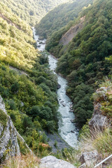 Fototapeta na wymiar Mountain river between rocks in Kabardino-Balkaria Russia