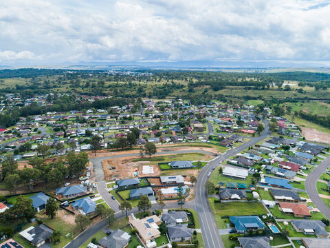 Housing area at the edge of town with new lots under development