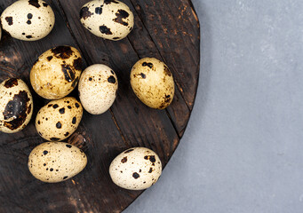 Quail eggs on a gray background. Proper nutrition. Diet food