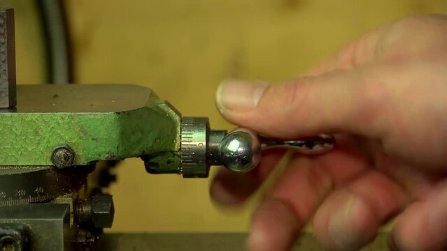 setting up the tool on a lathe, precision engineering.