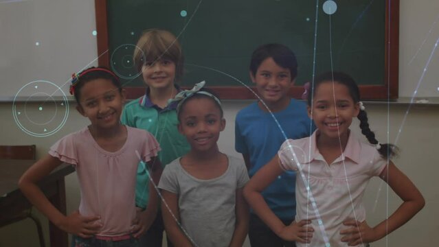 Network of connections against portrait of group of diverse students smiling in the class at school