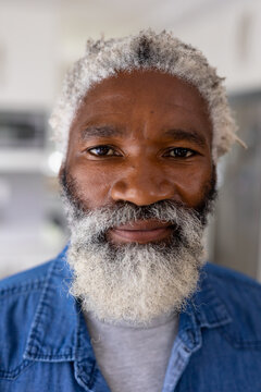 Close-up Portrait Of Senior African American Man White Hair And Beard At Home