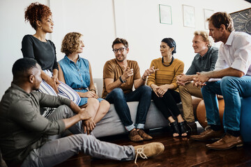 They boast a dynamic range of talents. Shot of a group of designers having a discussion in an office.
