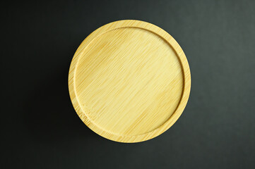 dish wood put on black table