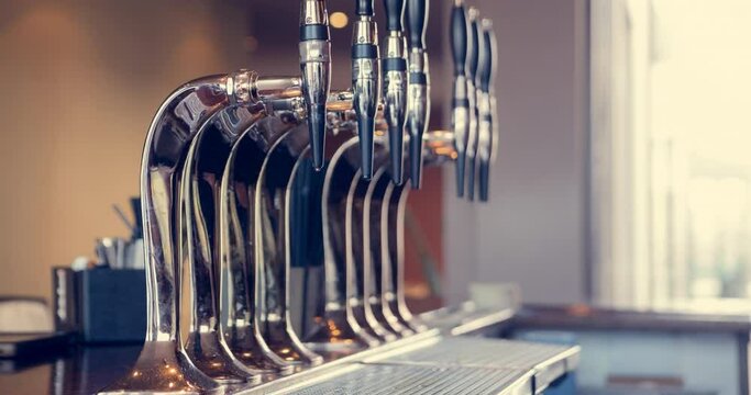 Animation of moving picture of beer taps on the bar