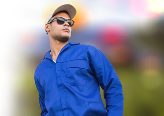 African american male worker wearing sunglasses against copy space on blurred background