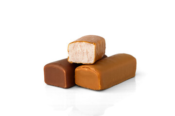 Cottage cheese bars in caramel glaze isolated on white background.