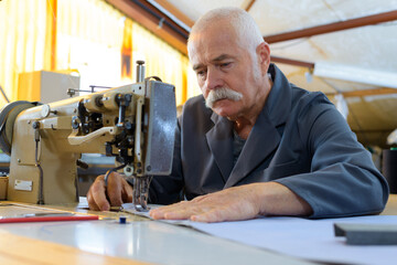 a senior man in factory