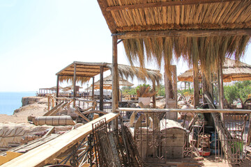 Fototapeta na wymiar Authentic gazebo on the shores of the Red Sea in Egypt. Atmospheric Antiquity Museum in Sharm El Sheikh