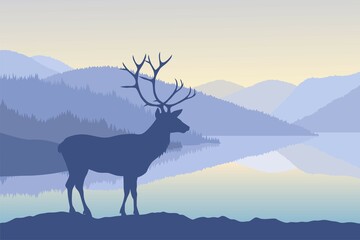 deer in the mountains and lake 
