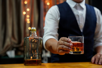 Bartender Serve Whiskey, on wood bar, 