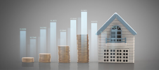 Model house mock up and coins. property real estate investment concept